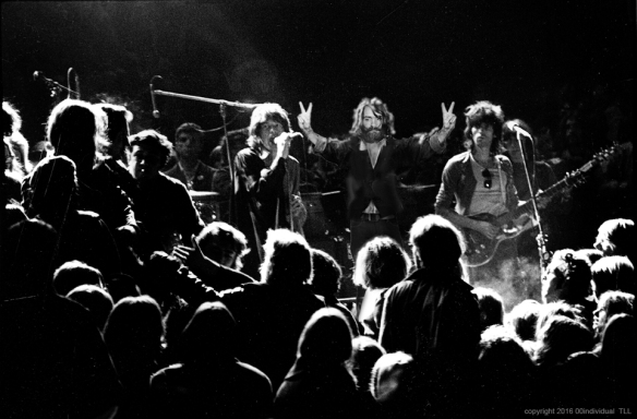 LIVERMORE, CA - DECEMBER 6: Mick Jagger and Keith Richards of the Rolling Stones warily eye the Hells Angels at The Altamont Speedway on December 6, 1969 in Livermore, California. (Photo by Robert Altman)